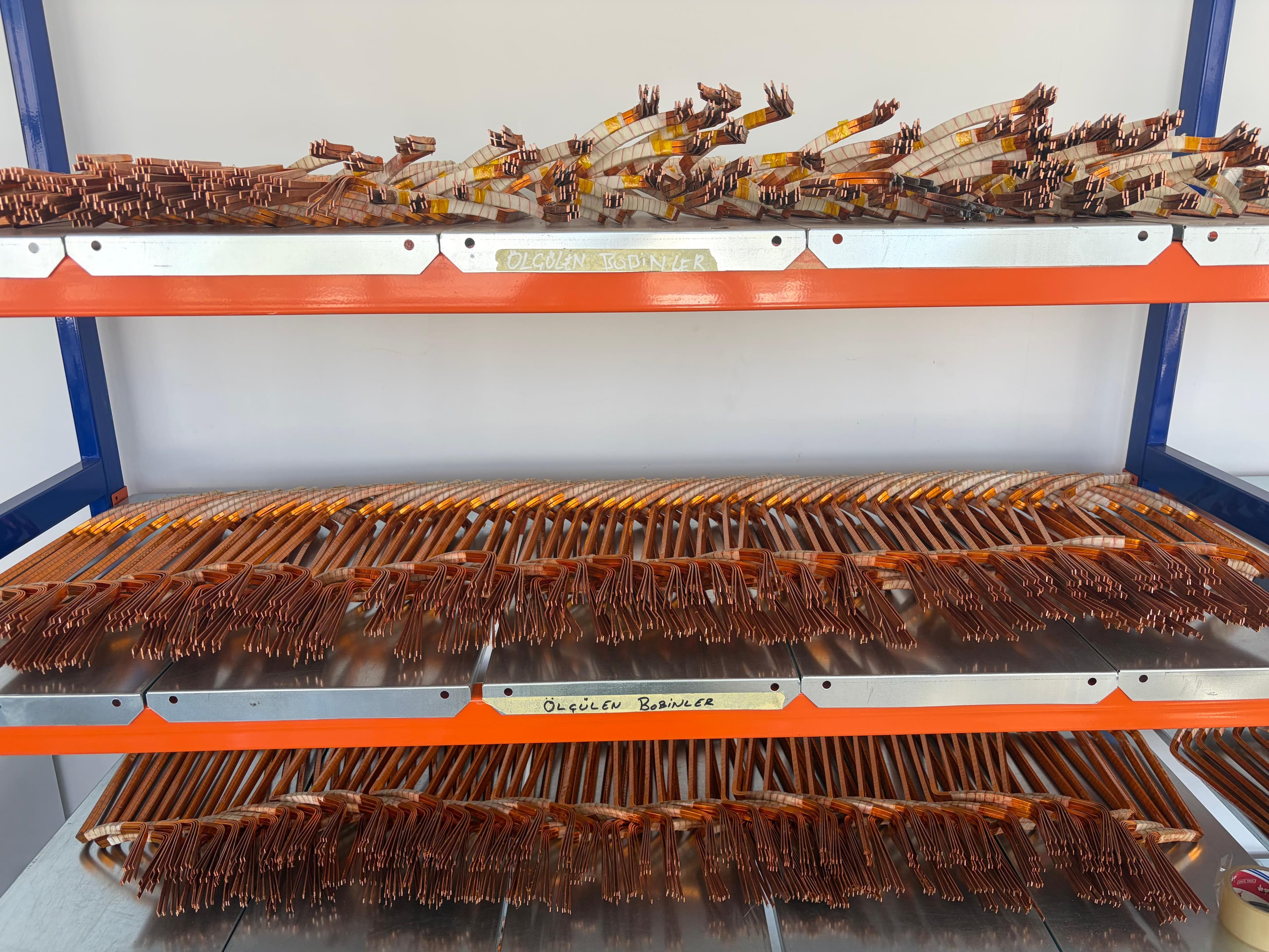 Copper winding bars stored on shelves