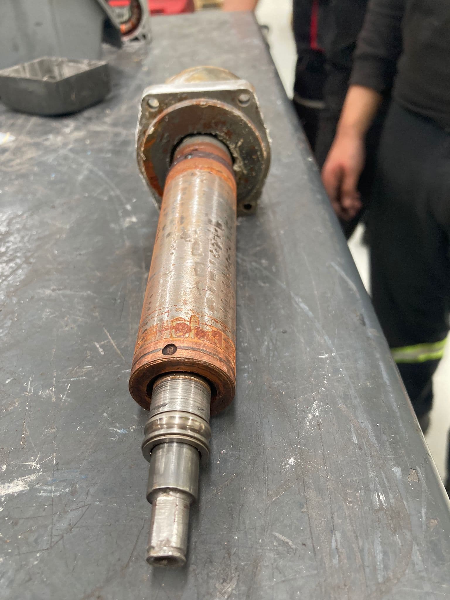 A rotor shaft on the workbench