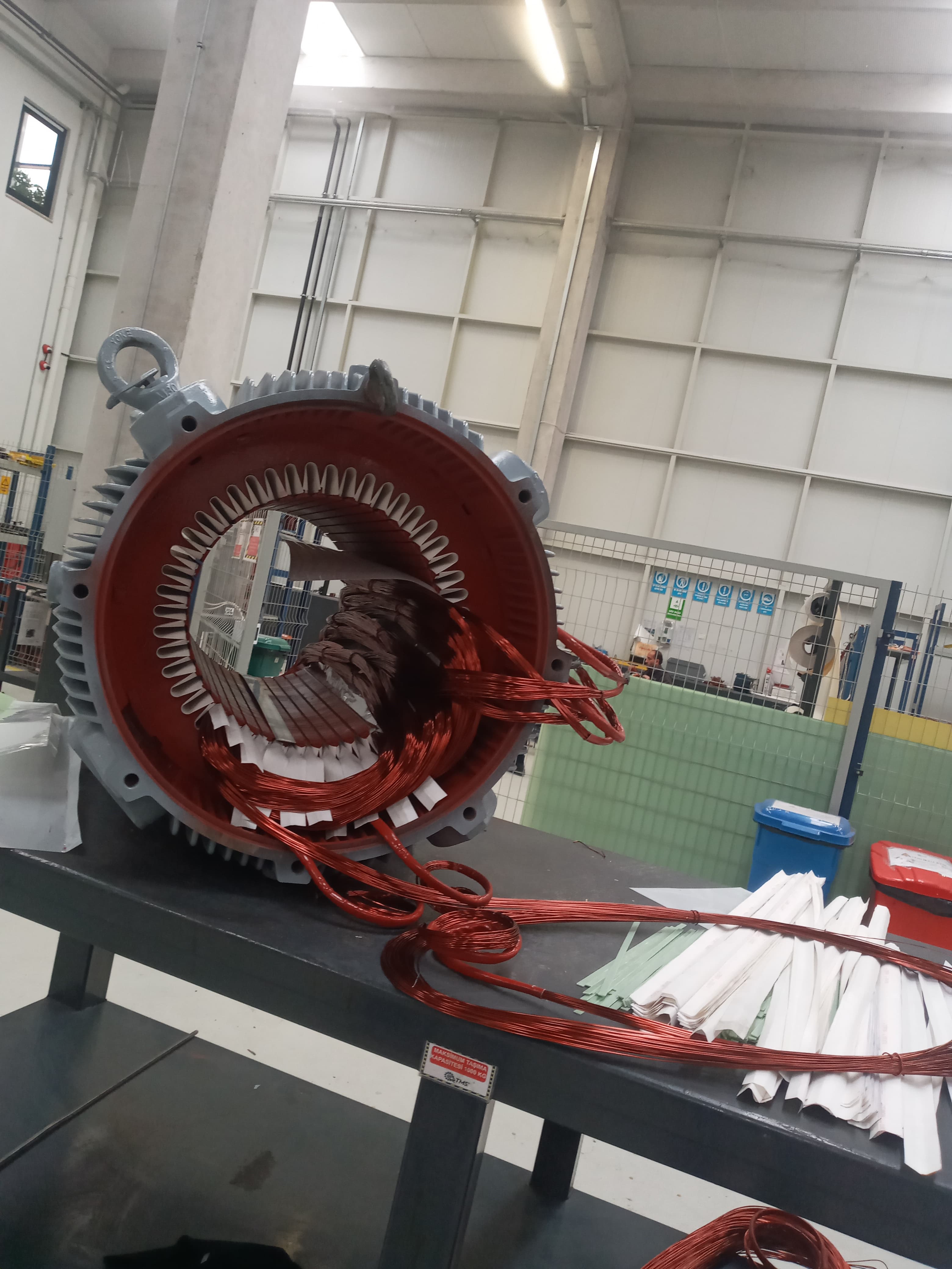 Inserting stator coils