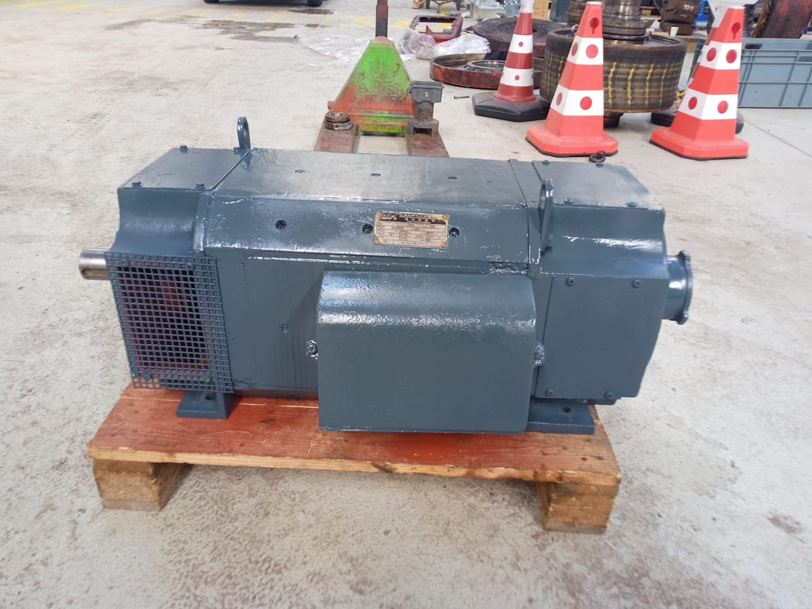 A large grey DC motor