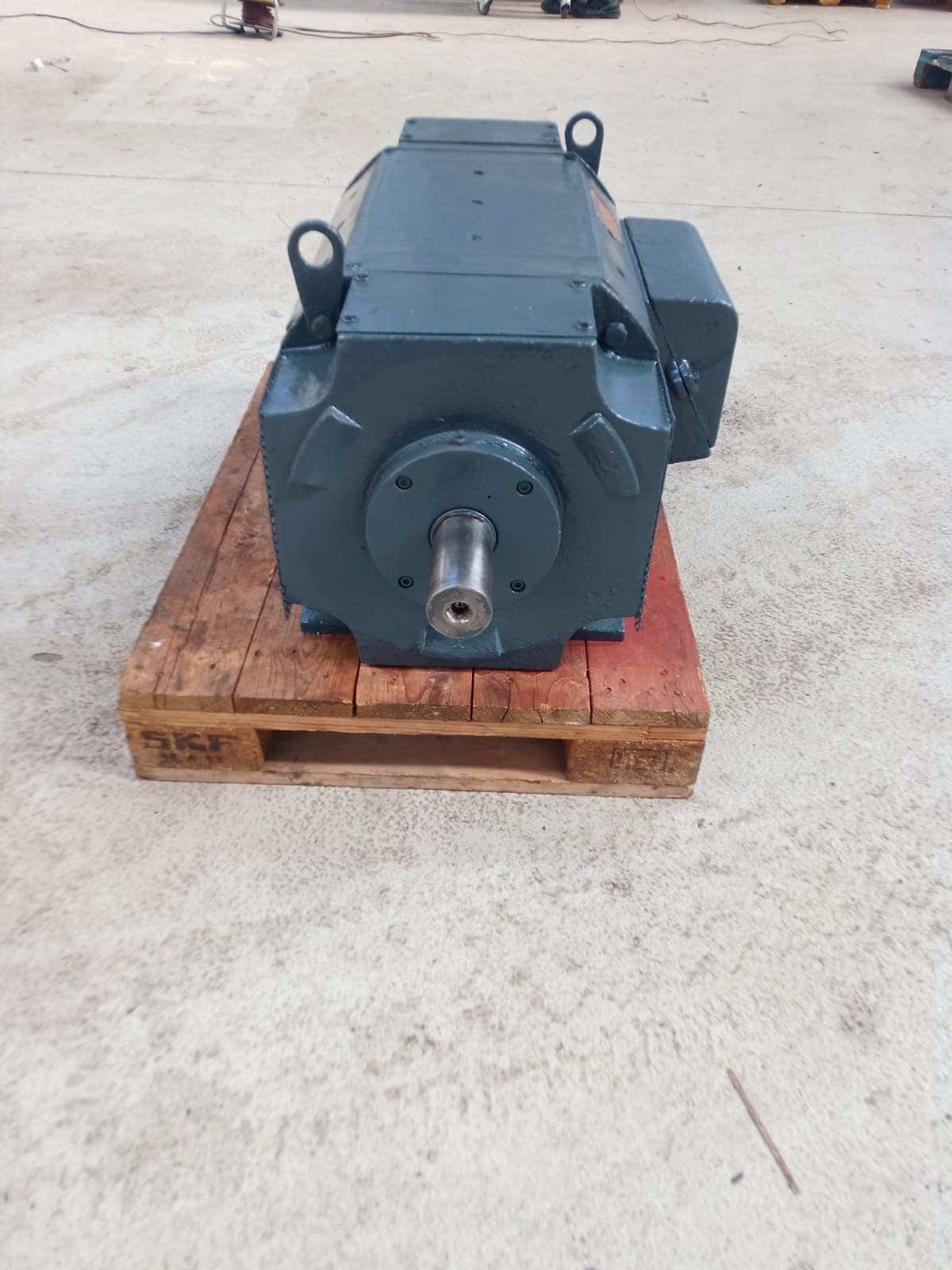 A small grey DC motor