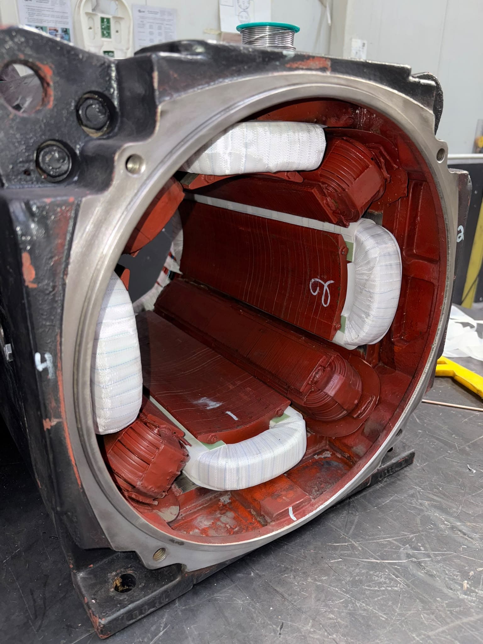 A stator housing with pole coils