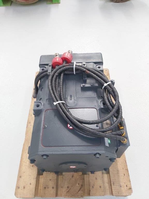 A motor with cables on a pallet