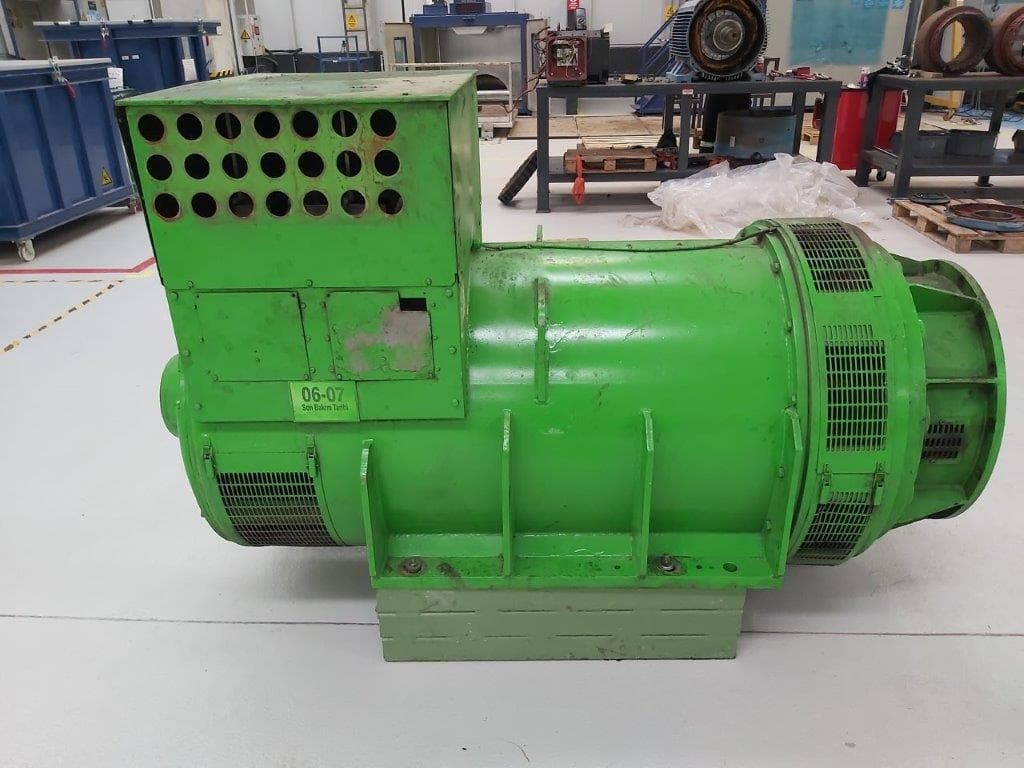 A green alternator in the workshop