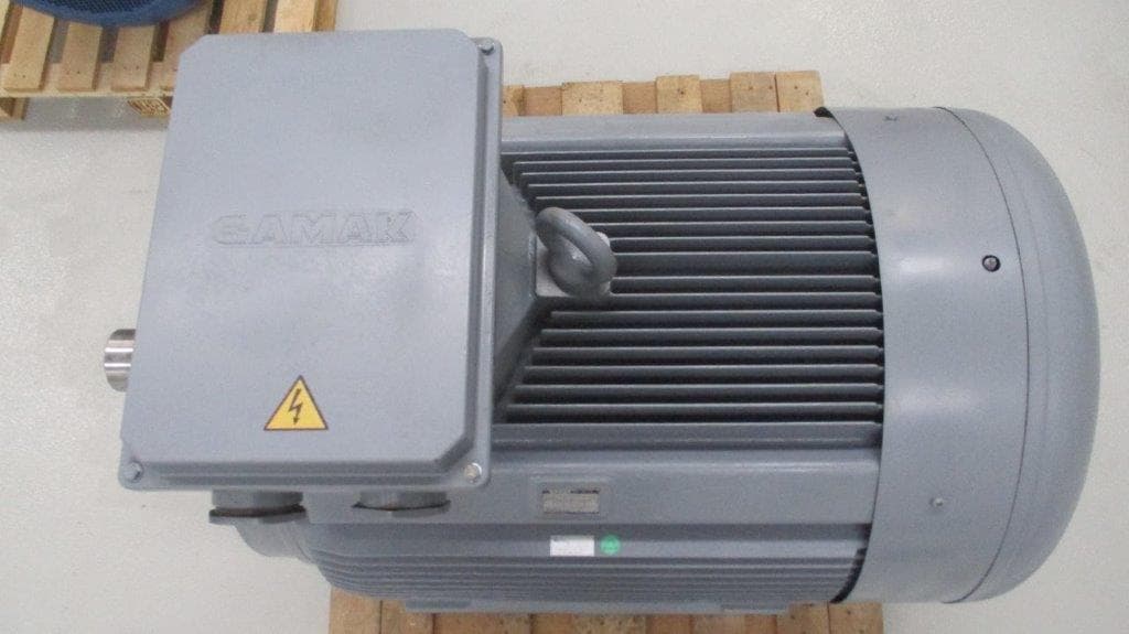 A grey motor with its terminal box