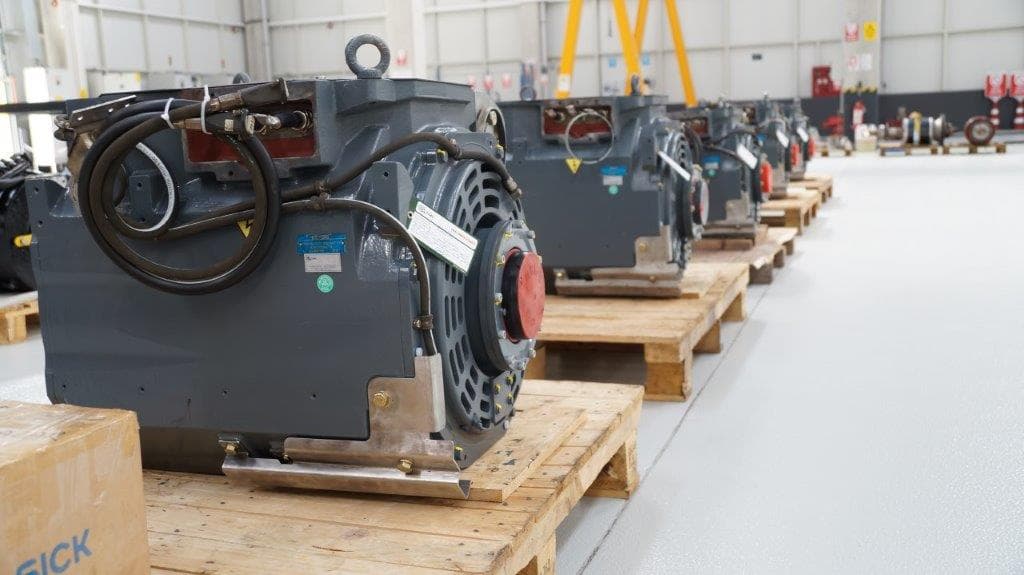 A traction motor with cooling hoses