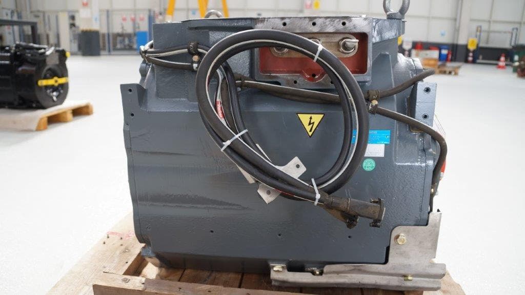 A traction motor with cables, side view
