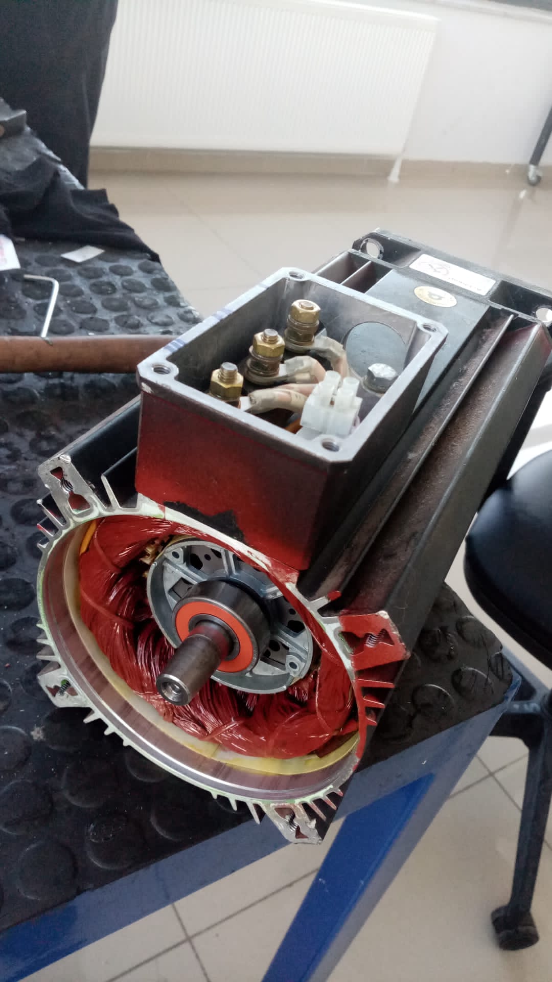 An open motor housing showing the winding