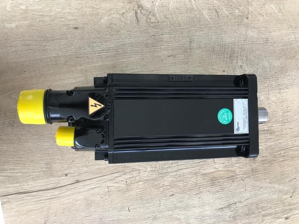 A servo motor with yellow connectors